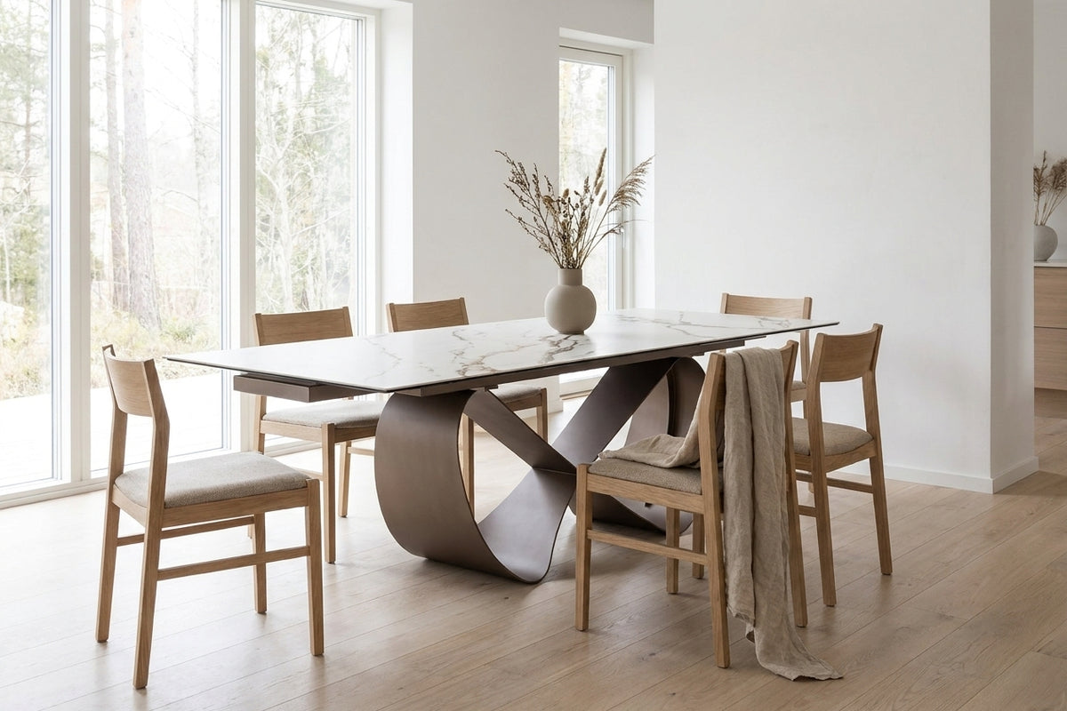 Sleek White Marble-Look Dining Table with Extension Leaves and Sculptural Base
